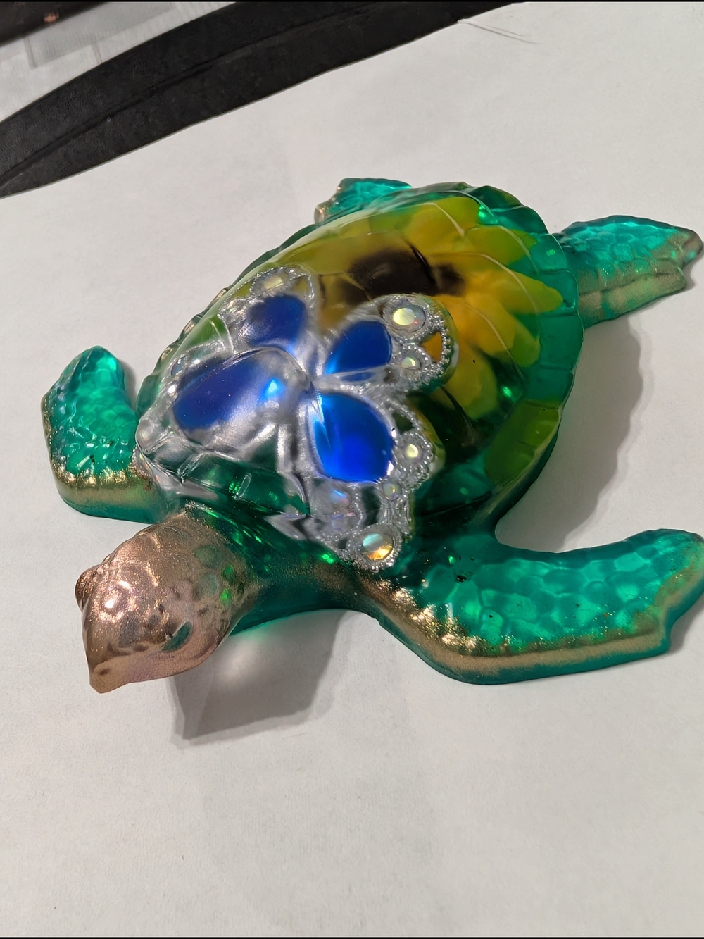 Abrand Teal Green and Blue Sea Turtle Accent Figure  with a butterfly inside.